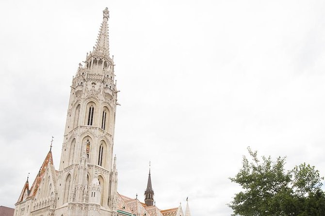 Buda Castle District Walk with Entry to Matthias Church - Castle District stories start at Holy Trinity Column