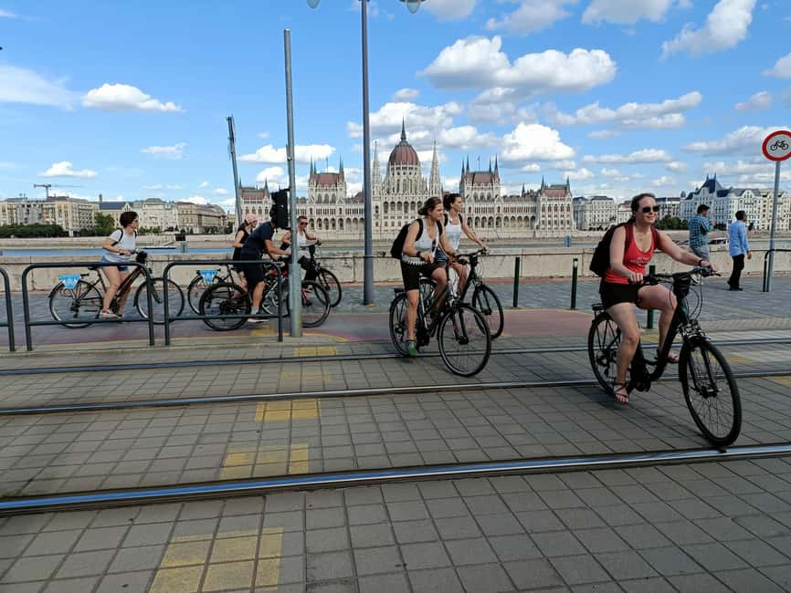 Budapest Bike Tour with a Hungarian Goulash - Buda-side atmosphere: Castle Hill views, Szabadság Square, and the Castle-bazaar
