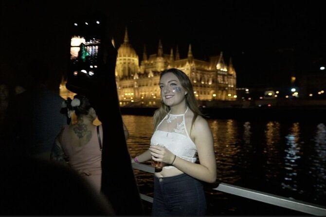 Budapest Danube Cruise with DJ, Drinks and After Party - MS Stadt Wien at night, with Budapest glowing behind you