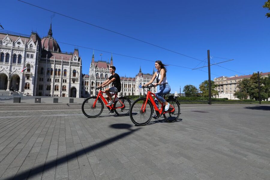 Budapest: Guided Downtown Electric Bike Tour - Crossing to Buda: Chain Bridge and the Danube Shoes view