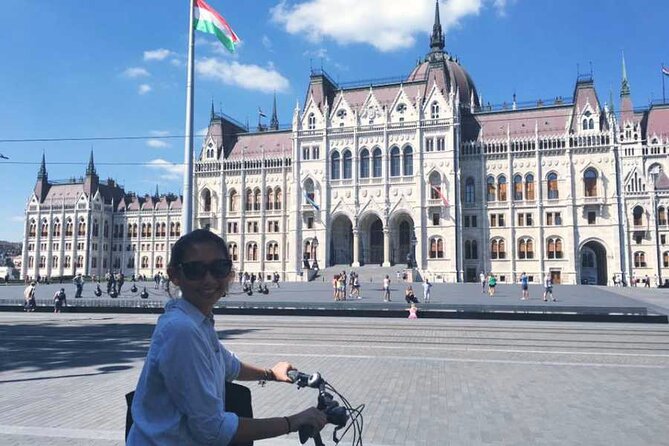 Budapest Highlights Bike Tour with a local guide - Opera House Stop: Neo-Renaissance Detail and a Transit Milestone