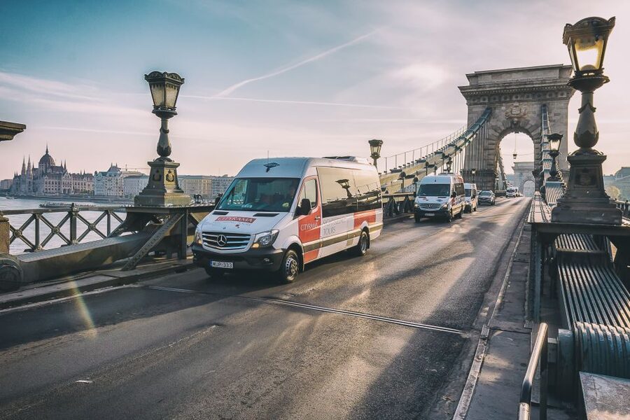 Castle District & Pest Driving Tour with Danube River Cruise - Pest Drive Highlights: Market, Synagogue, Heroes’ Square, and City Park