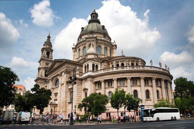 Classic Walk in Budapest Historical Center - Elizabeth Square: fountain monument and a giant ferris wheel