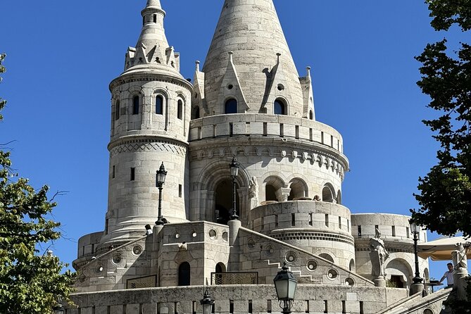 Gems of the Budapest Castle District Walking Tour - Turul bird, Matthias fountain, and the Castle courtyard you can read