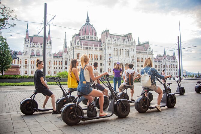 Guided Tours in Budapest on E-Scooter with various routes - Stop 1: Hungarian Parliament Building, explained from outside