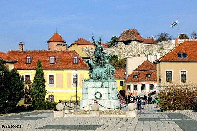 Home to Bull's Blood red wine! Eger with winetaste private tour - Minorita Templom: frescoes, carved benches, and baroque church details