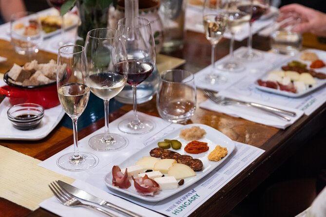 Palace District Evening Culinary, Wine, and History Walk - Key highlights