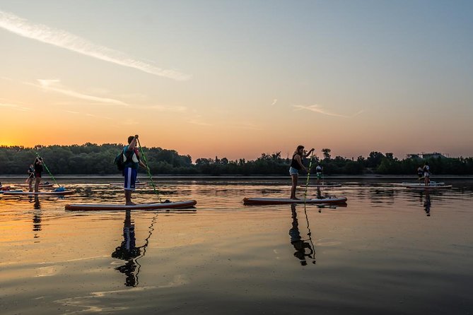 SUP Budapest: Sunset tour - What the sunset part looks like, with Parliament and bridges near the end